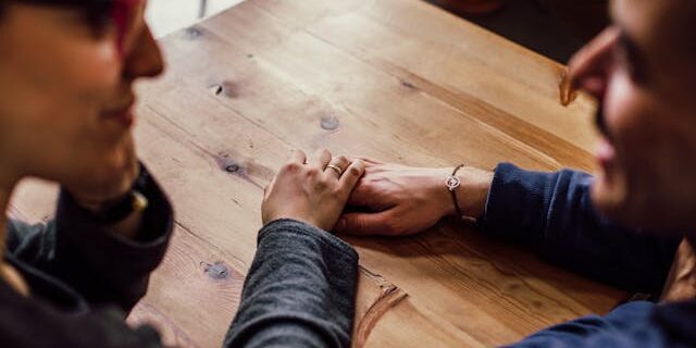 couple holding hands