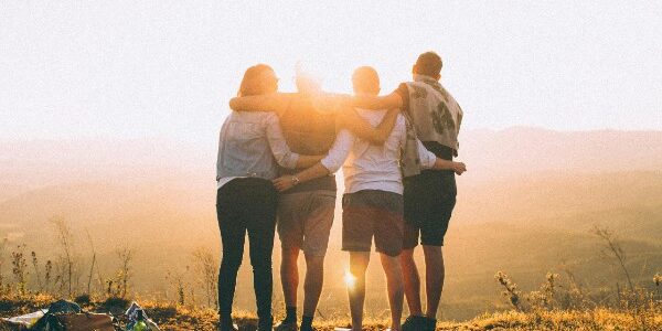 4 friends watching the sunset